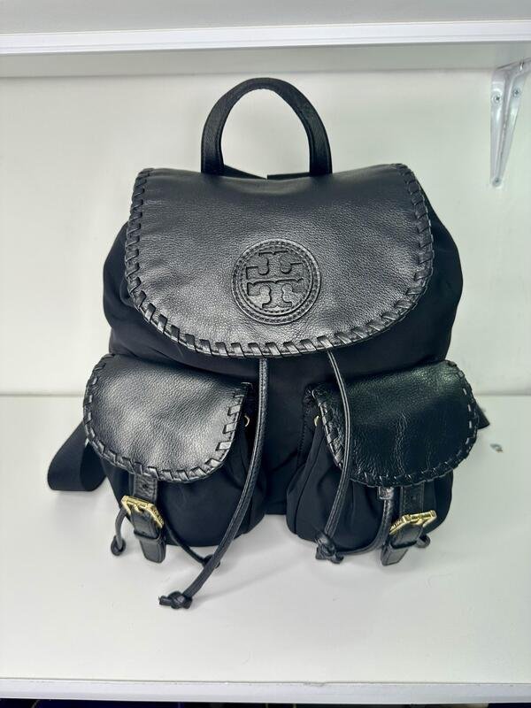 Mochila de piel con tela